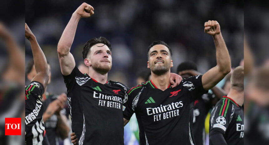 Arsenal defeated Real Madrid 2-1 to reach the Champions League semi-finals for the first time since 2009