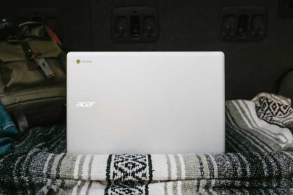 Acer Chromebook on a blanket in bed