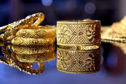 Gold Price Today: Yellow metal down ₹7k from record high on MCX, spot gold hits two-week low over profit booking