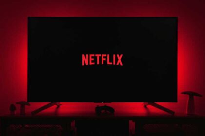 Netflix logo on smart TV with moody red backlighting