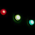Bright LED indicator status lights in darkness