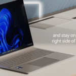 Windows 11 laptop ad. Text: "and stay on the right side of risk"