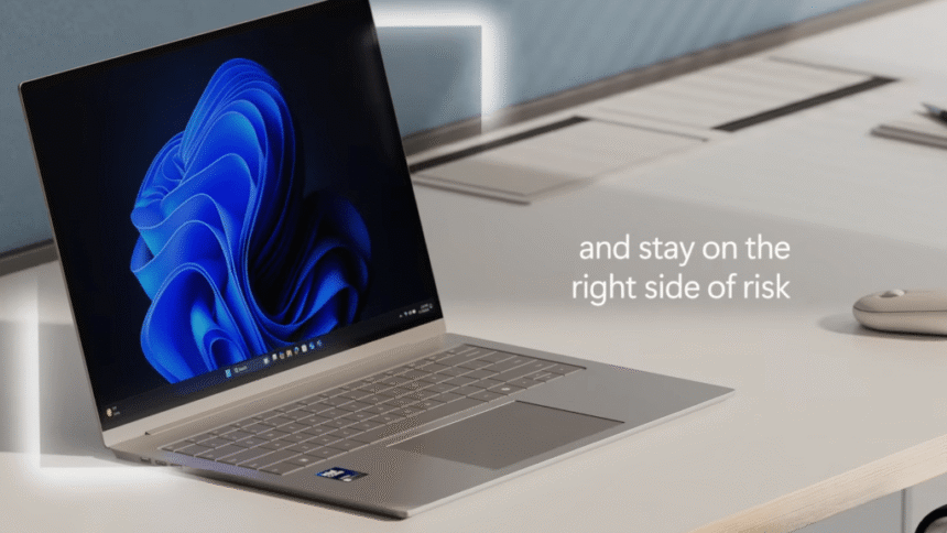 Windows 11 laptop ad. Text: "and stay on the right side of risk"
